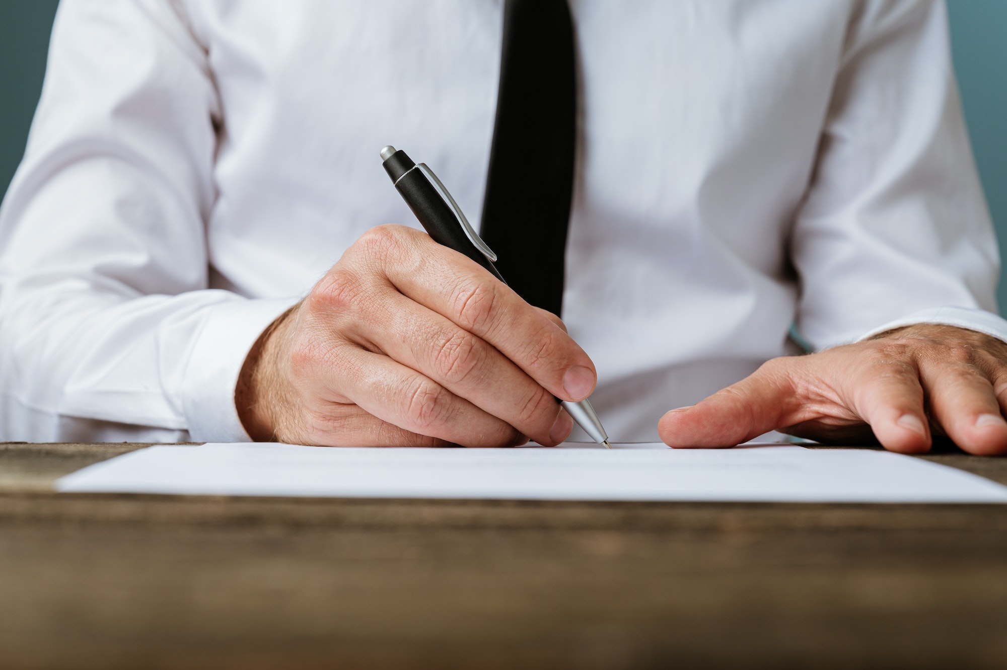 Businessman signing a contract